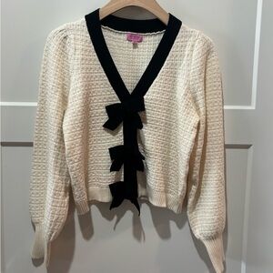 Francesca's Collections Cream V-Neck Sweater with Black Trim and Bows